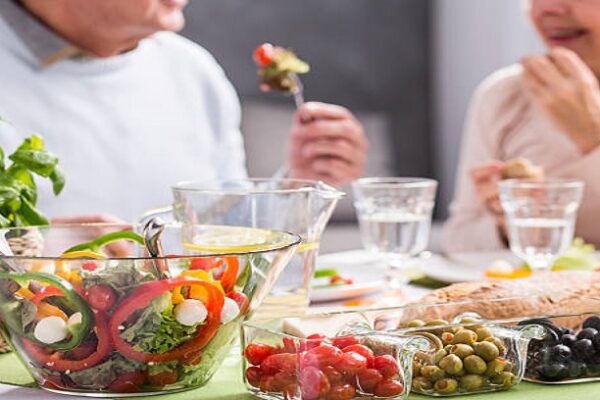 Cropped picture of an elderly couple eating a healthy dinner