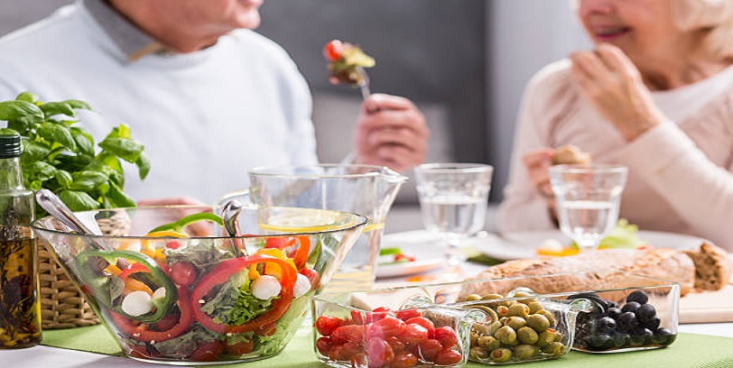 Cropped picture of an elderly couple eating a healthy dinner