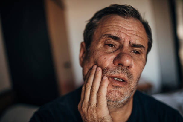 A mature man with a toothache